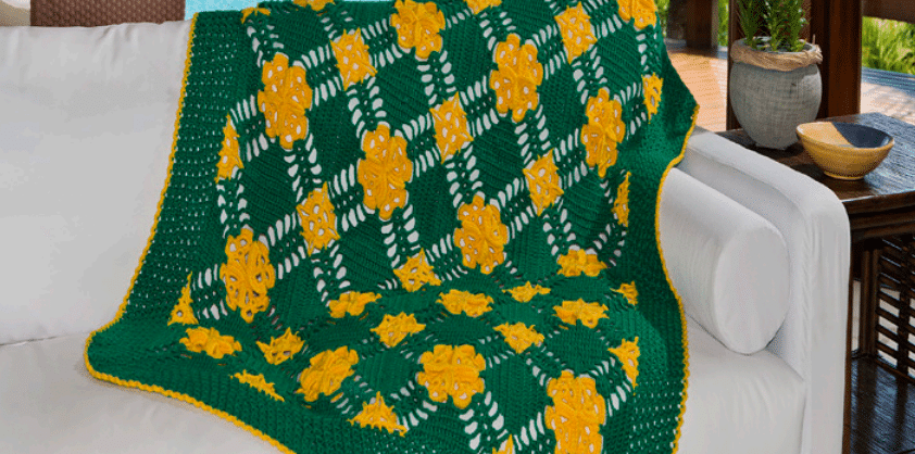 Manta de sofá em crochê verde e amarelo Cisne D’Primera