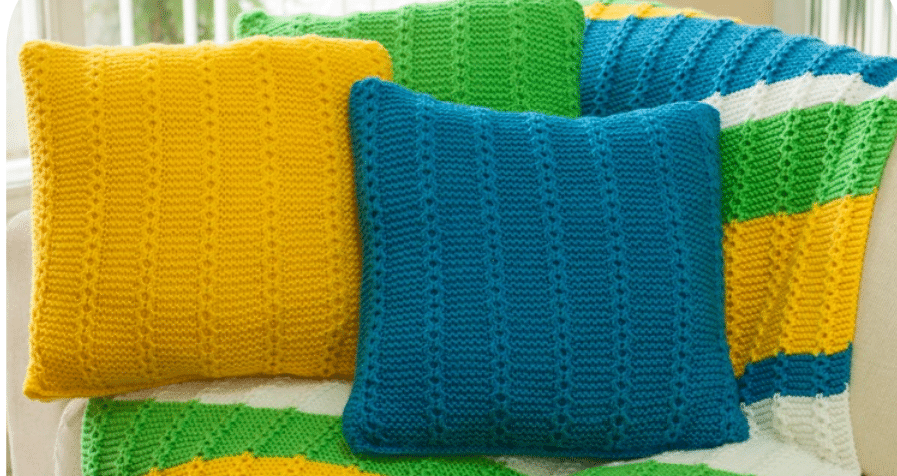 Manta de tricô e almofadas cores Brasil