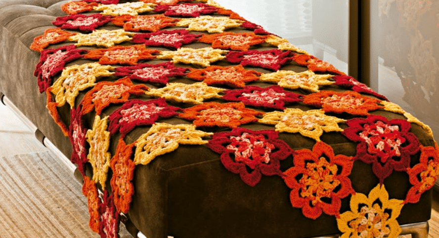 Manta de sofá em crochê floral tons de amarelo