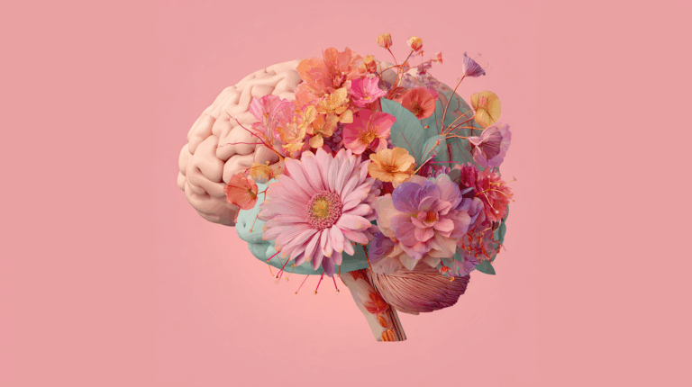 Ilustração de um cérebro em fundo rosa com flores coloridas brotando dele, simbolizando o florescimento da mente e a reprogramação de pensamentos positivos.